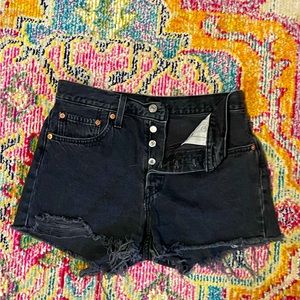 LEVI’S high rise washed black denim cut off shorts